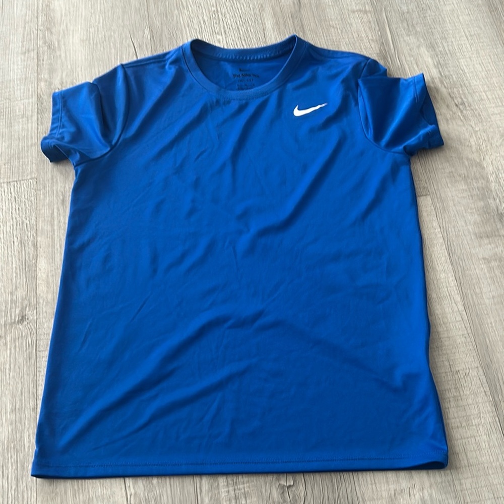 Blue Nike short sleeve tee.